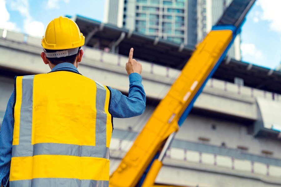 smart-asian-engineer-manager-with-safety-uniform-checking-site-construction-with-steel-concrete-sturcture-background_609648-1627
